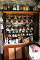 Cupboard holding family tableware at Foley's farm at Muckross Traditional Farms in Killarney National Park. Killarney, Ireland.