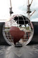 World globe with eternal flame at Dunbrody Famine Ship. New Ross, Ireland.