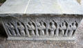 Carved stone tomb with saints in cathedral at Rock of Cashel. Cashel, Ireland.