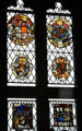 Stained glass armorial windows in Great Hall at Bunratty Castle. County Clare, Ireland.