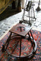 Vintage toddler's walker in Earl's bedroom at Bunratty Castle. County Clare, Ireland.