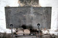 Cast iron fireplace back in Earl's private apartments at Bunratty Castle. County Clare, Ireland.