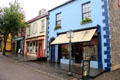 Village street representing typical 19thC Irish urban buildings at Bunratty Castle & Folk Park. County Clare, Ireland.