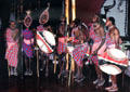 Masai dancers in traditional dress in Amboseli National Park. Kenya.