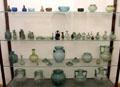 Roman glasswork from various locations & including cremation urns, tableware & toiletry vials at National Museum of History & Art. Luxembourg, Luxembourg.