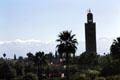 Koutoubia of Marrakesh with Atlas mountains in distance. Marrakesh, Morocco.