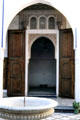 Courtyard fountain & doorway of Bahia Palace. Marrakesh, Morocco.