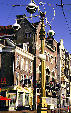 Buildings & street lamps on Rokin. Amsterdam, Netherlands.