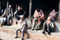 Men sitting in sun in Katmandu. Nepal.