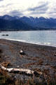 Kaikoura beach and mountains in the distance. New Zealand.