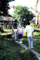 Wooden bridge on walkway to Palembei. Papua New Guinea.