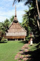Grass leads up to a house Tambaran in Palembei. Papua New Guinea.