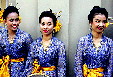 Dancers posing at the Vimanmek Teak House, Bangkok. Thailand.