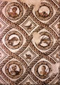 Roman mosaic tile floor with scrolled borders framing portraits & animals at Bardo Museum. Tunis, Tunisia.