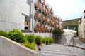 Rear wall over courtyard with steps at Scottish Parliament. Edinburgh, Scotland.