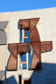 Dynamic skater abstract theme as screen on wall of Scottish Parliament. Edinburgh, Scotland.
