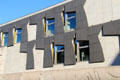Royal Mile facade of Scottish Parliament with dynamic skater theme. Edinburgh, Scotland.