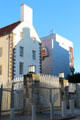 Old & new structure of Scottish Parliament over gated entrance. Edinburgh, Scotland.