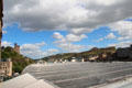 Salisbury Crags over glass roof of Waverley railway station. Edinburgh, Scotland.