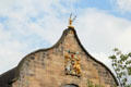 Crests on arched facade of Canongate Kirk. Edinburgh, Scotland.
