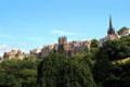 Buildings along ridge of Royal Mile seen from Princes Street Gardens. Edinburgh, Scotland.