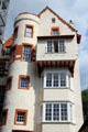 Red & white towered building on Royal Mile at corner of Edinburgh Castle. Edinburgh, Scotland.