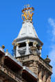 Tower with gilded openwork sphere sculpture by Gilbert Bayes atop former Forsyth's department store. Edinburgh, Scotland.