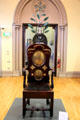 Oak chair with Black Stone dolerite slab upon which University of Glasgow students sat for oral exams as far back as 1451 at Hunterian Museum. Glasgow, Scotland.