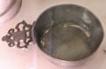 English pewter bleeding bowl with measuring lines at Hunterian Museum. Glasgow, Scotland.