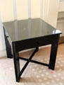Small ebonized cube table by C.R. Mackintosh on modern copy of original carpet in drawing room at Hill House. Helensburgh, Scotland.