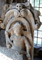 Stone carving of figure under skull & crossbones at Dunfermline Palace. Dunfermline, Scotland.
