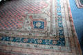 Persian pink & blue carpet in dining room at Lauriston Castle. Edinburgh, Scotland.