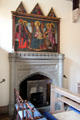Madonna & child with saints painting over gothic fireplace in chapel at Abbotsford House. Melrose, Scotland.