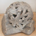 Carved stone vaulting boss with leaves in museum at Jedburgh Abbey. Jedburgh, Scotland.