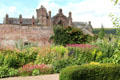 Melrose Abbey over walls of Priorwood Garden. Melrose, Scotland