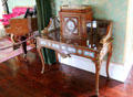 French Empire desk with porcelain inlays in large drawing room at Thirlestane Castle. Scotland.