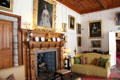 Drawing room with carved oak fireplace at Drum Castle. Drumoak, Scotland