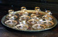 Silver tray with gold-trimmed tea glasses at Fyvie Castle. Turriff, Scotland.