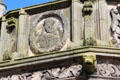 Mercat Cross parapet carved bas-relief of Stuart king James I in oval-frame by John Montgomery of Old Rayne on Castlegate square. Aberdeen, Scotland.