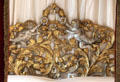 Gilded headboard on four-poster bed in tapestry bedroom at Cawdor Castle. Cawdor, Scotland.