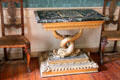Pietra dure table supported by entwined dolphins in private drawing room at Duff House. Banff, Scotland.