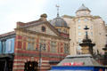 Watershed building, now home to many art activities & weather vane with ship on nearby dome. Bristol, England.
