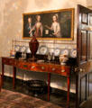 Side board with China & serving dishes under family portrait typical of the era at Georgian House Museum. Bristol, England.