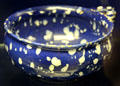 Ceramic porringer , with decoration meant to resemble candle wax on dark blue glaze, made in London or Brislington at Bristol Museum & Art Gallery. Bristol, England.