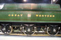 Great Western Railway name plate & coat-of-arms on locomotive tender at STEAM Museum of Great Western Railway. Swindon, England.
