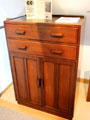 Example of "utility furniture", which was produced during the 1940's under government restrictions limiting the quantity of materials which could be used, with simple but elegant designs at a reasonable price at Gordon Russell Design Museum. Broadway, England.