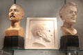 Bust of C.R. Ashbee plaster cast in relief of Gerard Bishop & bust of Laurence Housman all associated with Guild of Handicraft at Court Barn Museum. Chipping Campden, England.
