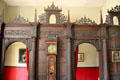 Detail of ornate wooden screen separating sitting room from hallway at Chastleton House. Moreton-in-Marsh, England.
