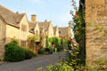 Street lines with traditional Cotswold stone homes. Stanton, England