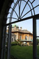 House viewed from Orangery window at Sezincote. Moreton-in-Marsh, England.